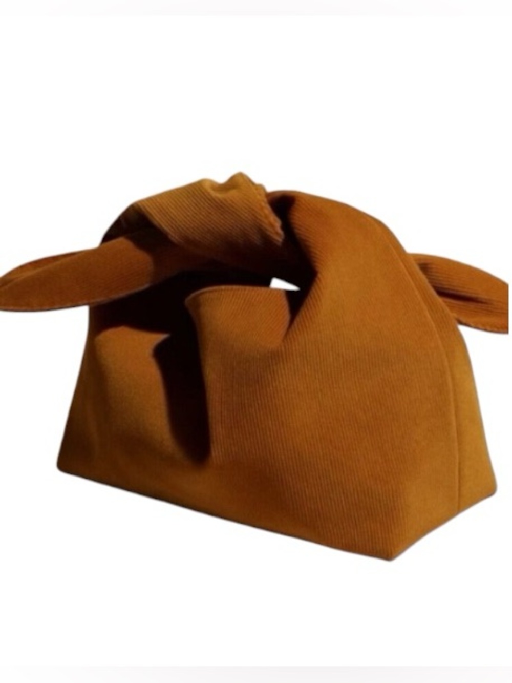Merit Beauty corduroy knot-top makeup pouch